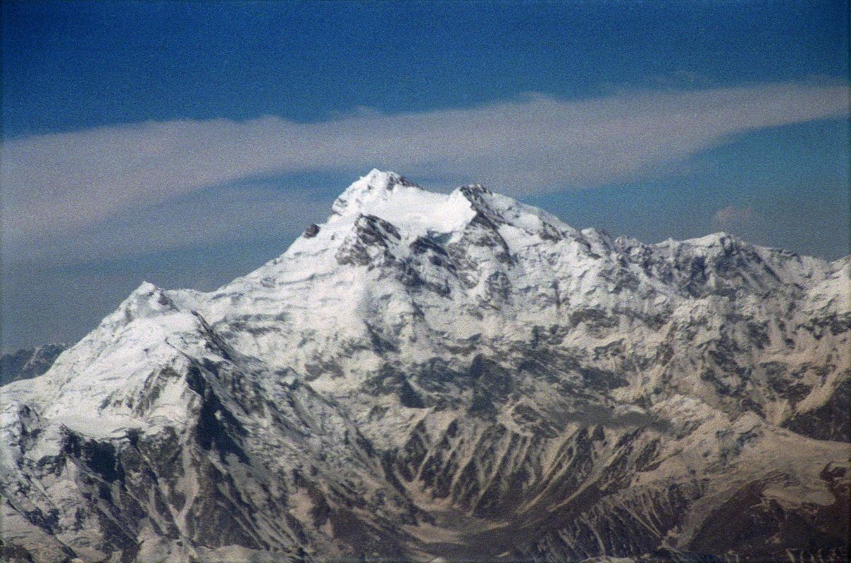 10 Nanga Parbat Rakhiot Face, Rakhiot Peak, Silver Saddle, East Peak, Silver Plateau, Summit, North Peaks On Flight From Islamabad To Skardu The flight around Nanga Parbat continues with Hermann Buhls route of first ascent becoming perfectly visible. Rakhiot Peak leads up to the Silver Saddle between the Nanga Parbat Southeast and East Peaks, and up to the summit with the North Peaks on the right.